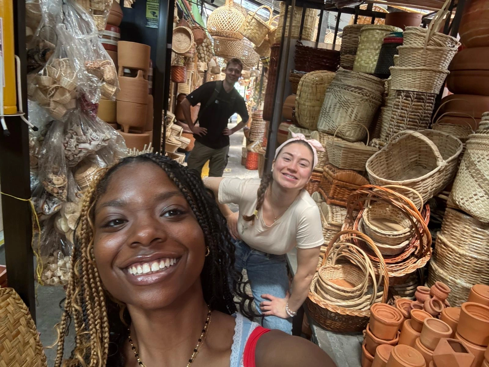 Adult students exploring a local Colombian market as part of an immersive Spanish course experience in Colombia.
