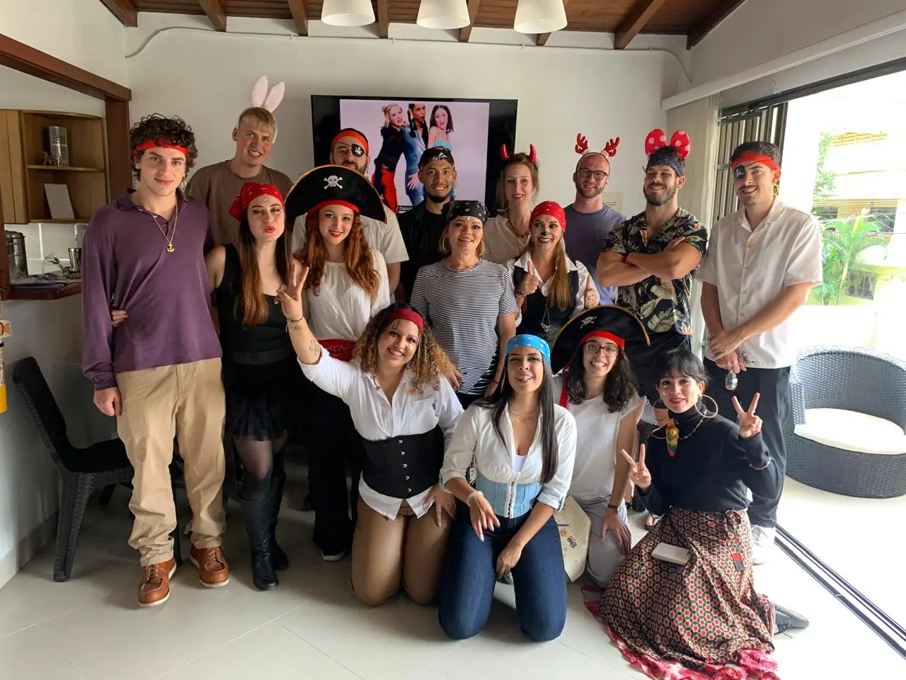 Group of adult students enjoying fun Spanish lessons and cultural immersion activities at Elefun Spanish School in Medellín